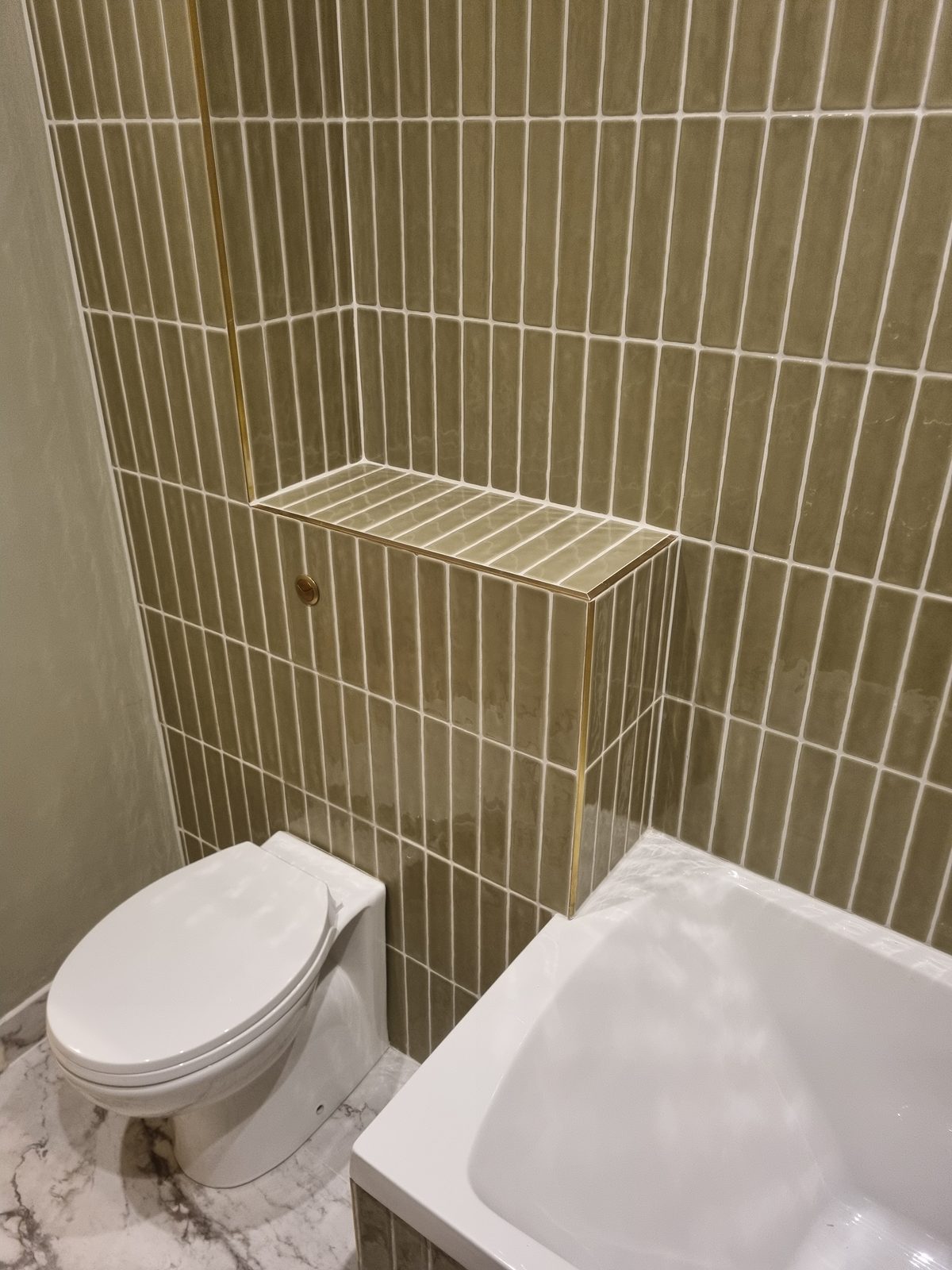 The vanity, with brass fittings.